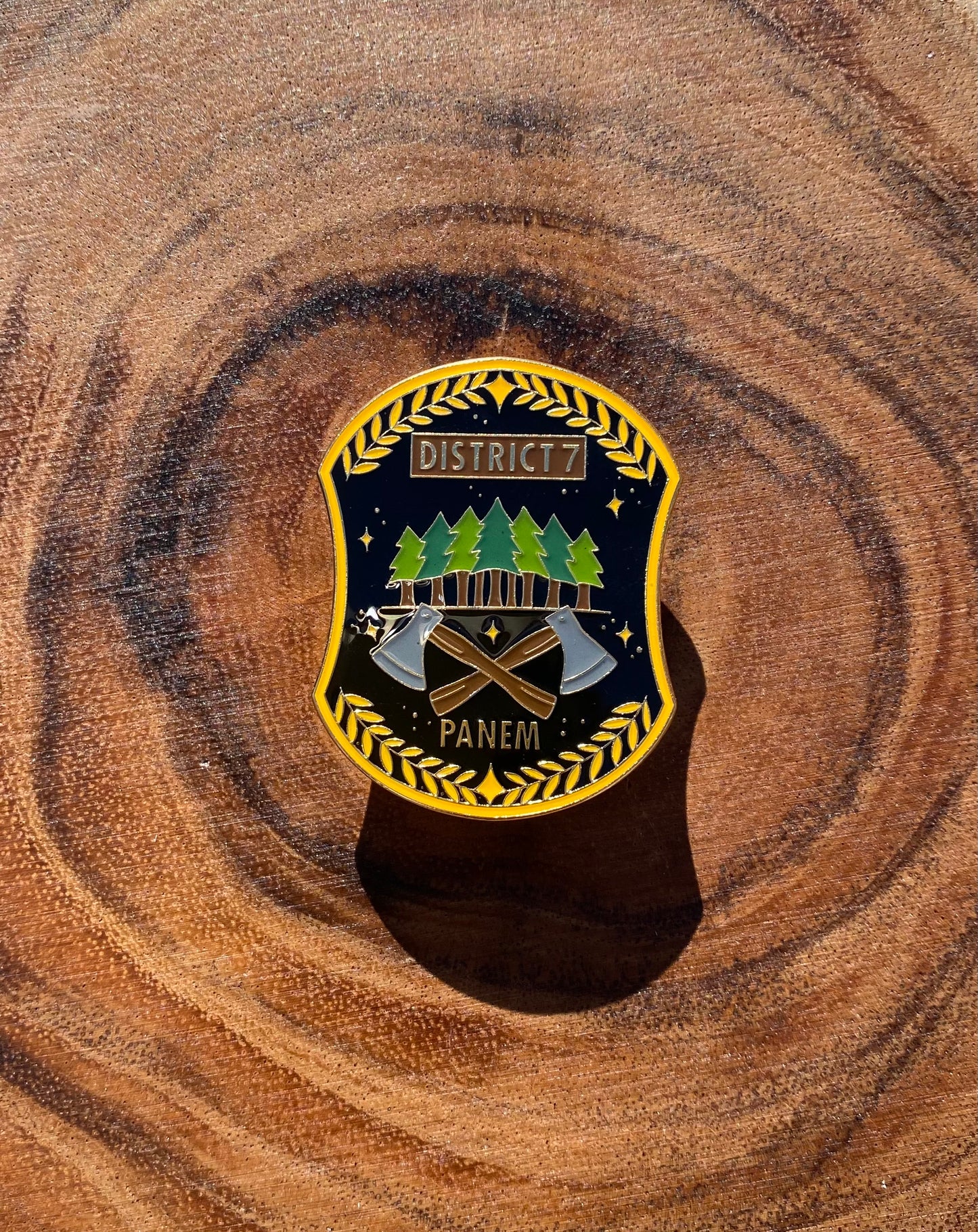 District 7 The Hunger Games Enamel and Epoxy Top Coat Pin