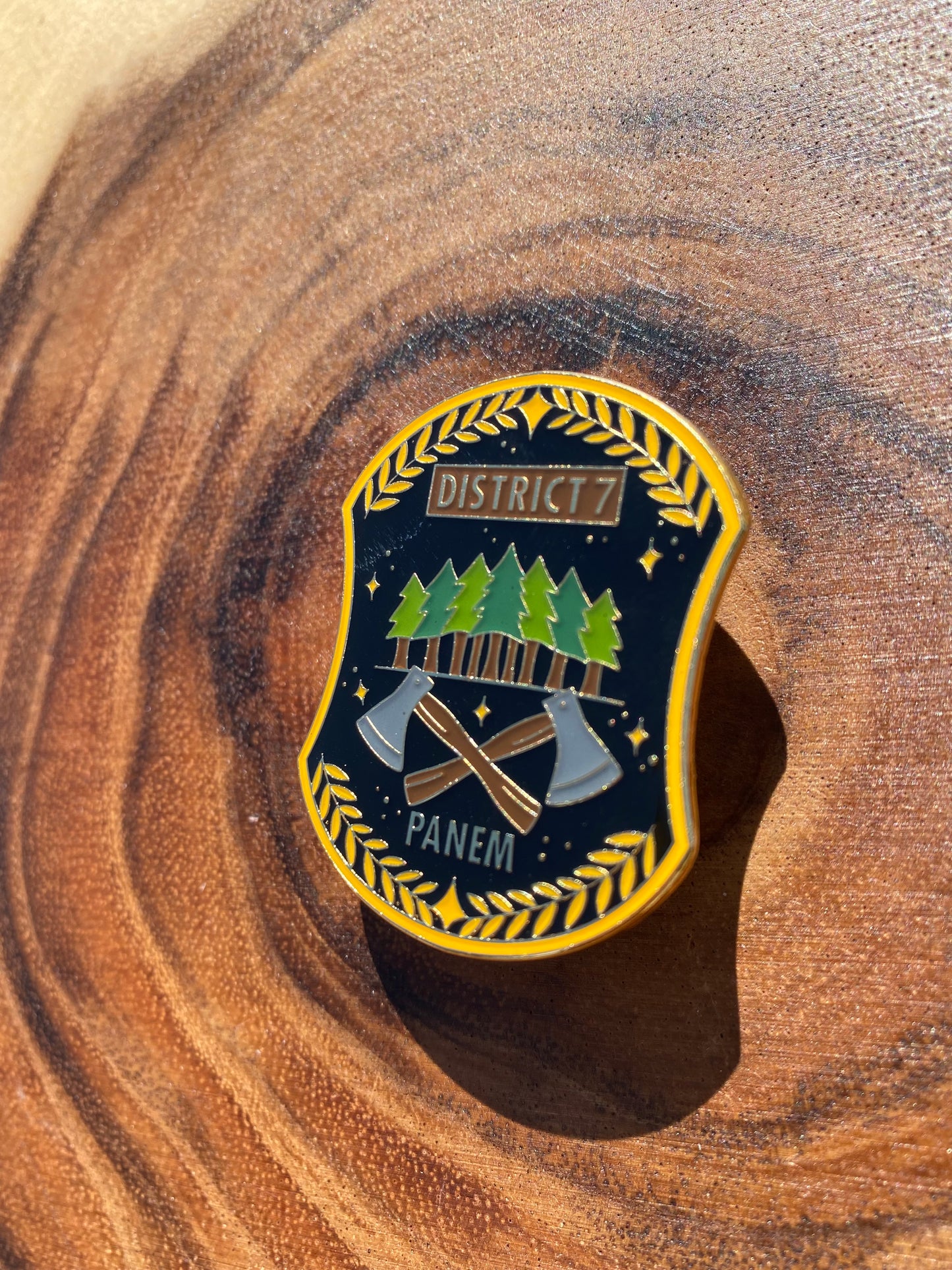 District 7 The Hunger Games Enamel and Epoxy Top Coat Pin