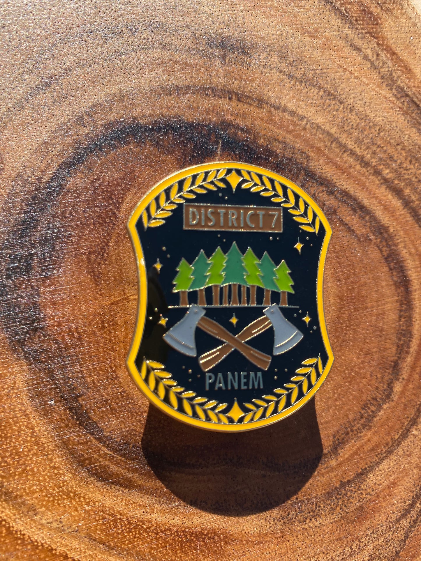 District 7 The Hunger Games Enamel and Epoxy Top Coat Pin